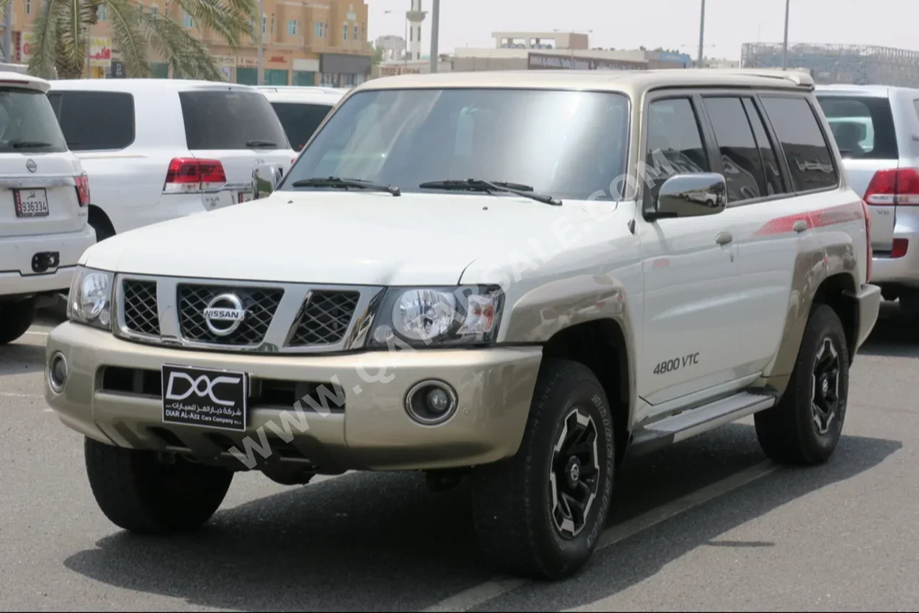 Nissan  Patrol  Super Safari  2021  Automatic  12,000 Km  6 Cylinder  Four Wheel Drive (4WD)  SUV  White  With Warranty