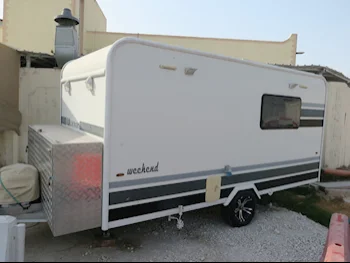 Caravan - 2015  - White  -Made in Qatar