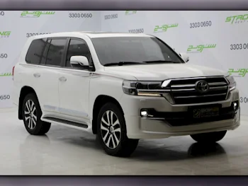 Toyota  Land Cruiser  GXR- Grand Touring  2019  Automatic  133,500 Km  8 Cylinder  Four Wheel Drive (4WD)  SUV  White