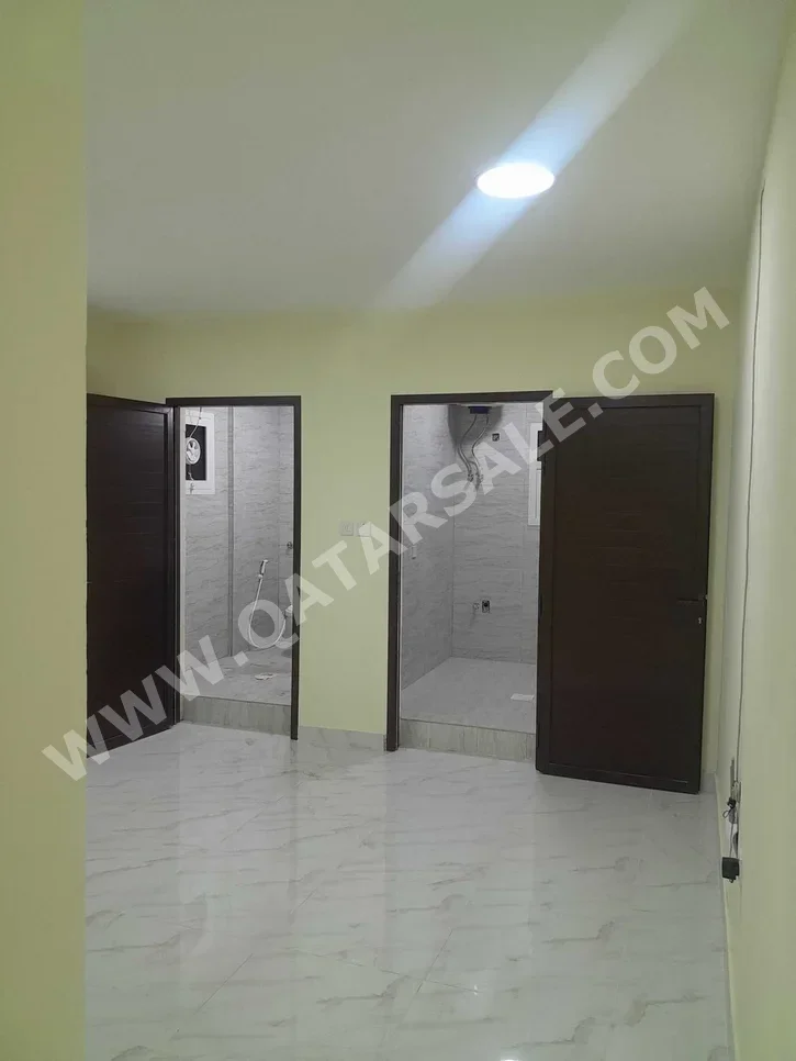 2 Bedrooms  Apartment  in Doha -  Umm Ghuwailina  Not Furnished