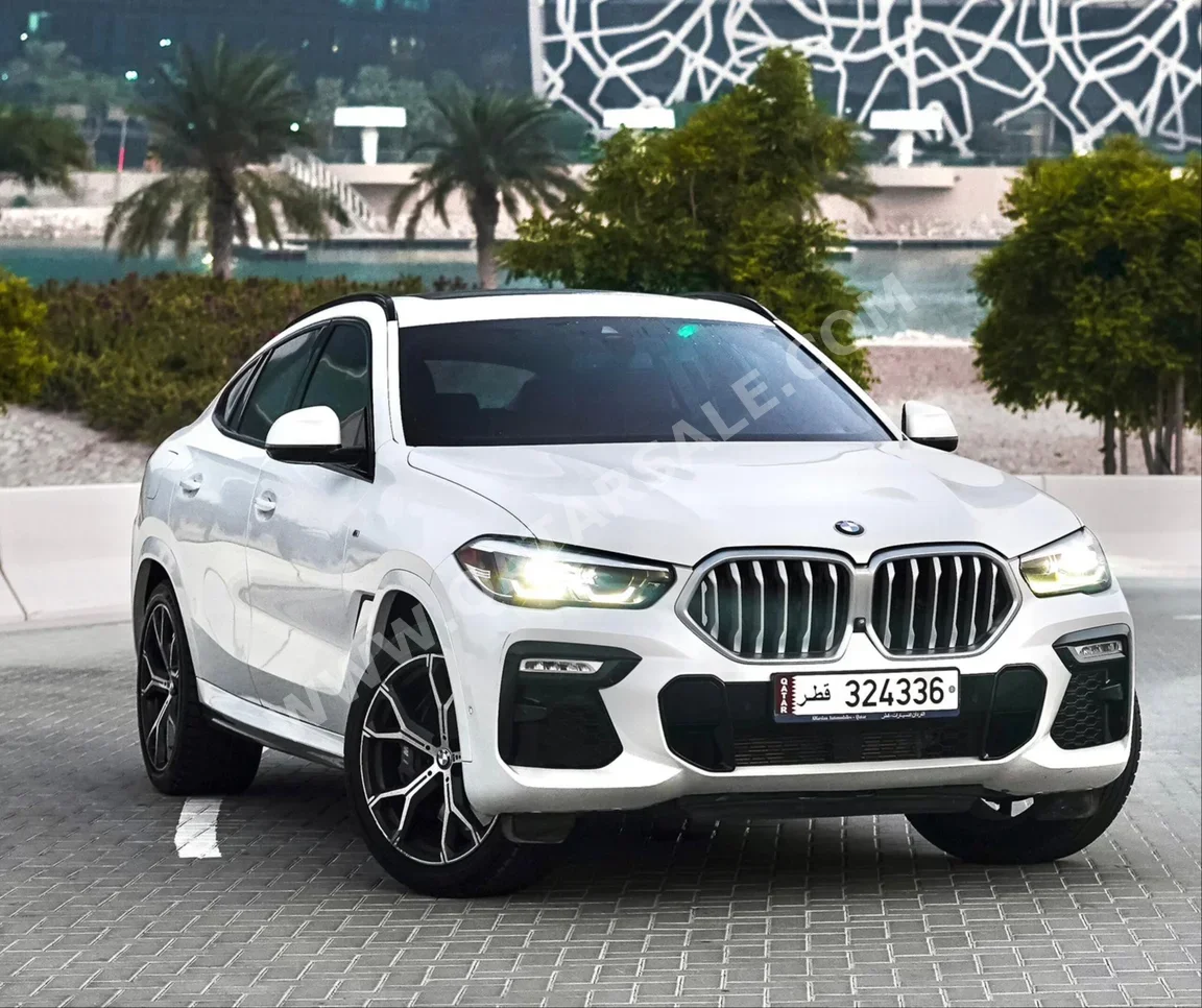 BMW  X-Series  X6  2020  Automatic  45,000 Km  8 Cylinder  Four Wheel Drive (4WD)  SUV  White  With Warranty