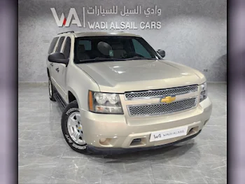 Chevrolet  Suburban  2011  Automatic  240,000 Km  8 Cylinder  Four Wheel Drive (4WD)  SUV  Gold