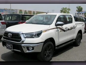 Toyota  Hilux  2024  Automatic  0 Km  4 Cylinder  Four Wheel Drive (4WD)  Pick Up  White  With Warranty