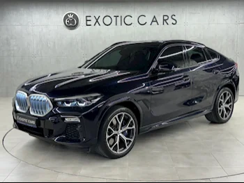  BMW  X-Series  X6 M40i  2021  Automatic  18,000 Km  6 Cylinder  Four Wheel Drive (4WD)  SUV  Black  With Warranty