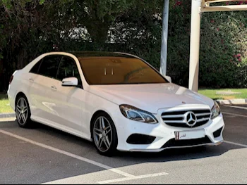 Mercedes-Benz  E-Class  300  2015  Automatic  77,000 Km  6 Cylinder  Rear Wheel Drive (RWD)  Sedan  White