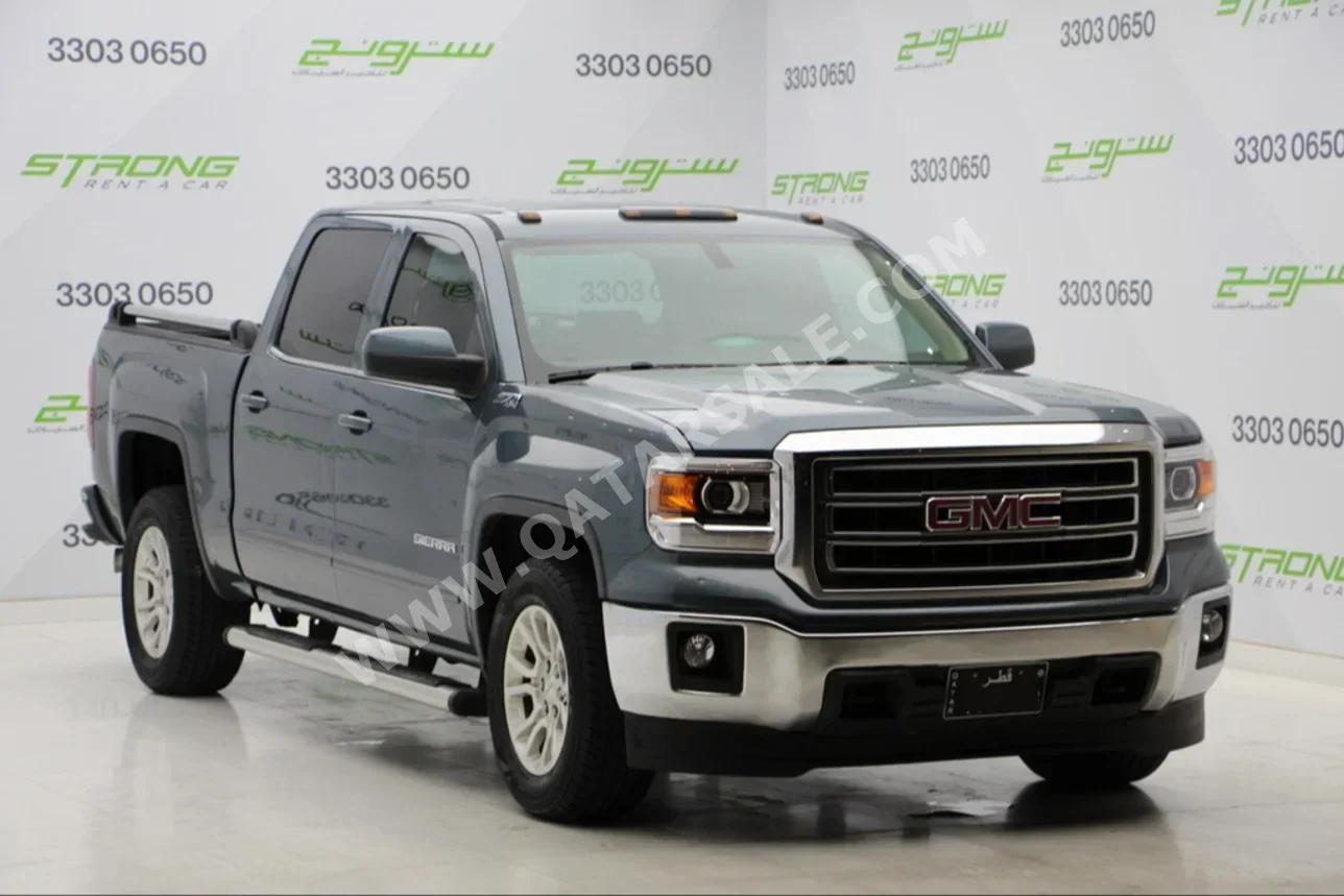  GMC  Sierra  2015  Automatic  119,000 Km  8 Cylinder  Four Wheel Drive (4WD)  Pick Up  Gray  With Warranty