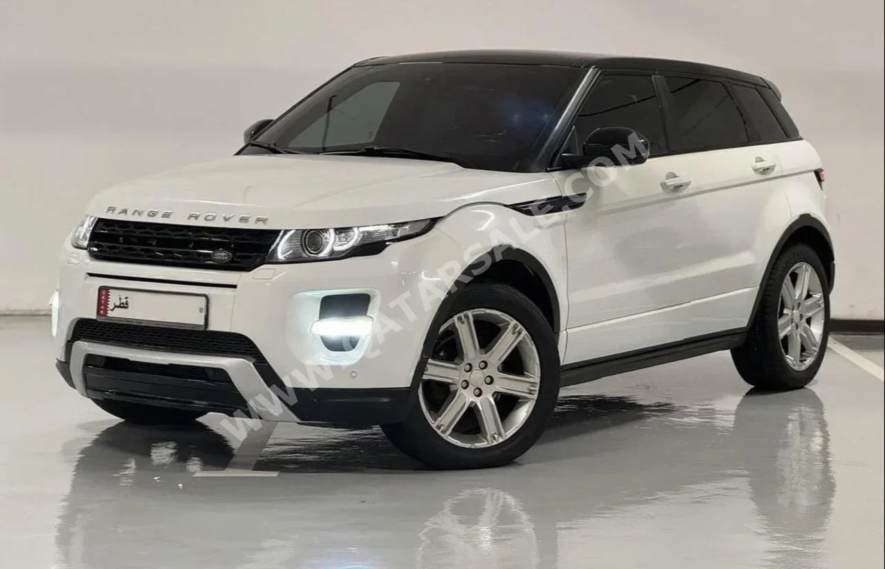 Land Rover  Evoque  2015  Automatic  98,000 Km  4 Cylinder  Four Wheel Drive (4WD)  SUV  White