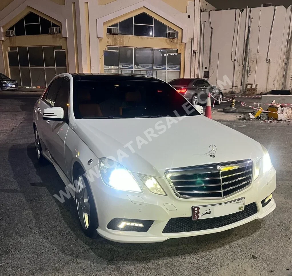 Mercedes-Benz  E-Class  300  2011  Automatic  166,000 Km  6 Cylinder  Rear Wheel Drive (RWD)  Sedan  White