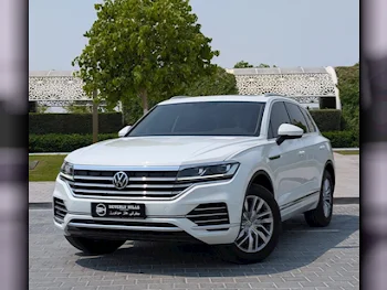 Volkswagen  Touareg  Highline plus  2021  Automatic  22,175 Km  6 Cylinder  All Wheel Drive (AWD)  SUV  White  With Warranty