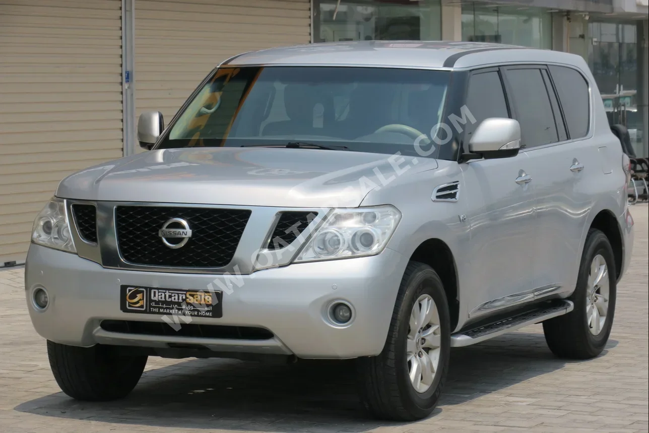 Nissan  Patrol  SE  2012  Automatic  218,000 Km  8 Cylinder  Four Wheel Drive (4WD)  SUV  Silver