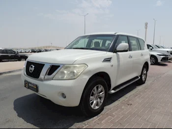 Nissan  Patrol  SE  2013  Automatic  200,000 Km  8 Cylinder  Four Wheel Drive (4WD)  SUV  White