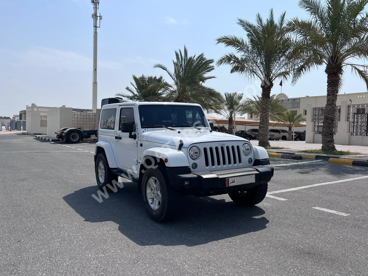 Jeep  Wrangler  Sahara  2013  Automatic  131,000 Km  6 Cylinder  Four Wheel Drive (4WD)  SUV  White