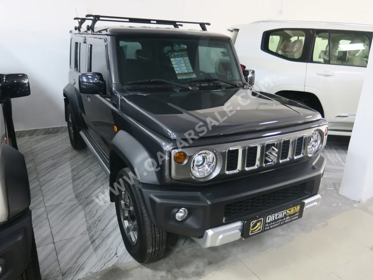 Suzuki  Jimny  2024  Automatic  13,000 Km  4 Cylinder  Four Wheel Drive (4WD)  SUV  Gray  With Warranty