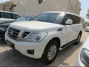 Nissan  Patrol  SE  2015  Automatic  213,000 Km  8 Cylinder  Four Wheel Drive (4WD)  SUV  White