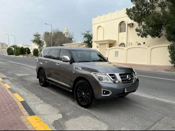 Nissan  Patrol  Platinum  2015  Automatic  99,200 Km  8 Cylinder  Four Wheel Drive (4WD)  SUV  Gray