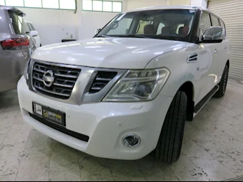 Nissan  Patrol  SE  2014  Automatic  187,000 Km  8 Cylinder  Four Wheel Drive (4WD)  SUV  White