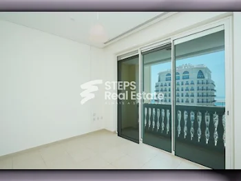 2 Bedrooms  Apartment  in Doha -  The Pearl  Semi Furnished