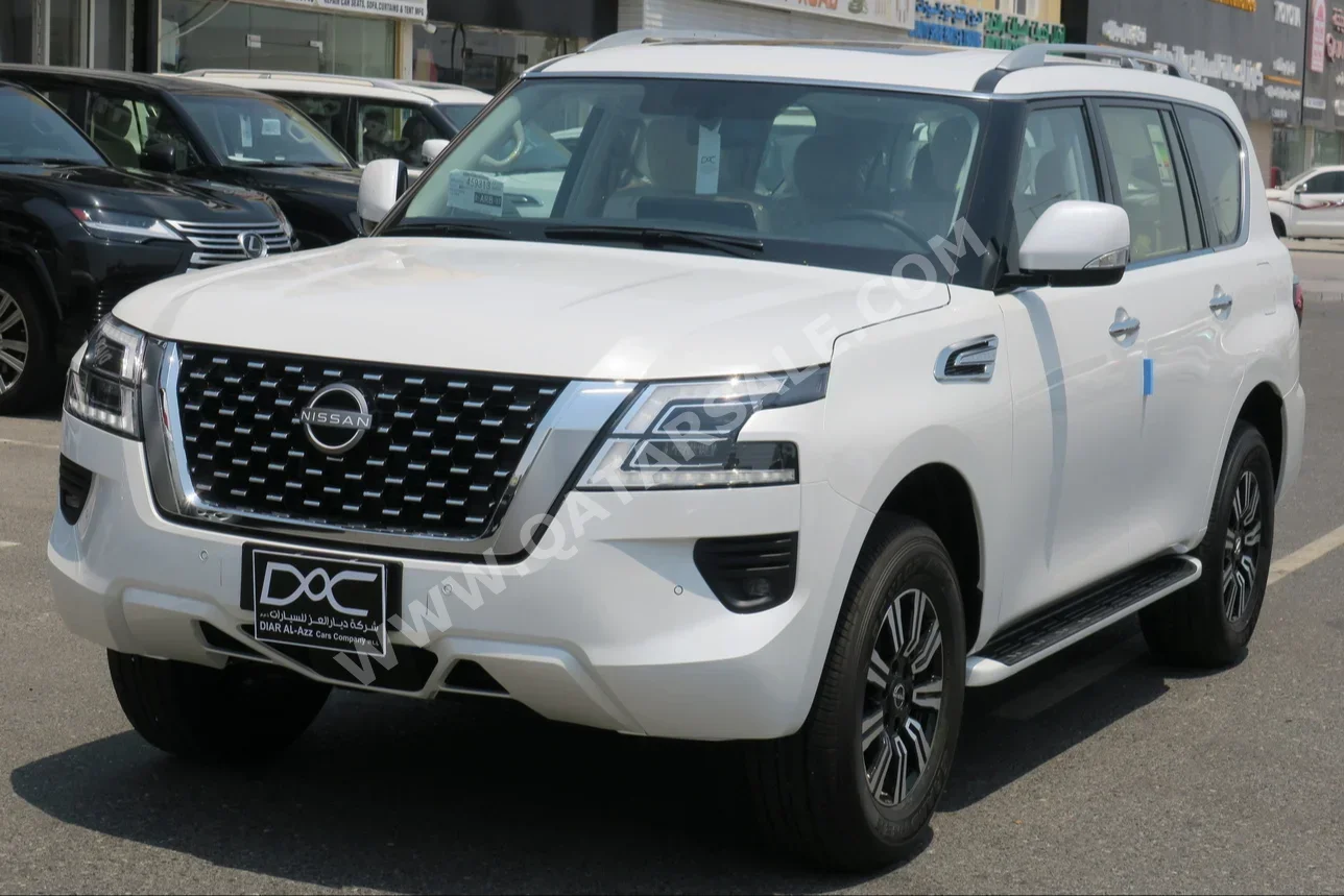 Nissan  Patrol  SE  2024  Automatic  0 Km  6 Cylinder  Four Wheel Drive (4WD)  SUV  White  With Warranty