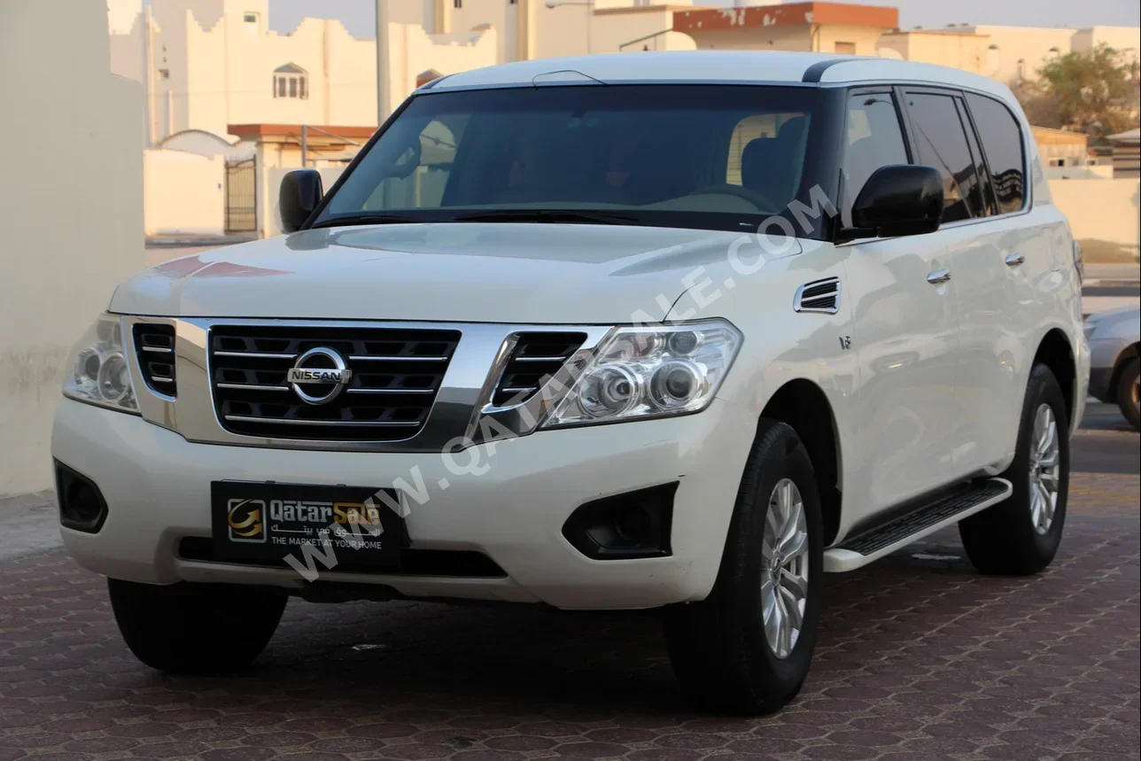 Nissan  Patrol  XE  2016  Automatic  140,000 Km  8 Cylinder  Four Wheel Drive (4WD)  SUV  White