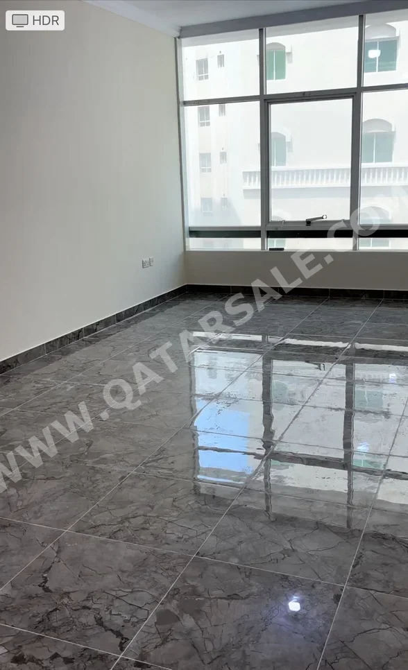 2 Bedrooms  Apartment  in Doha -  New Doha  Not Furnished