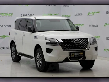 Nissan  Patrol  XE  2022  Automatic  34,000 Km  6 Cylinder  Four Wheel Drive (4WD)  SUV  White  With Warranty