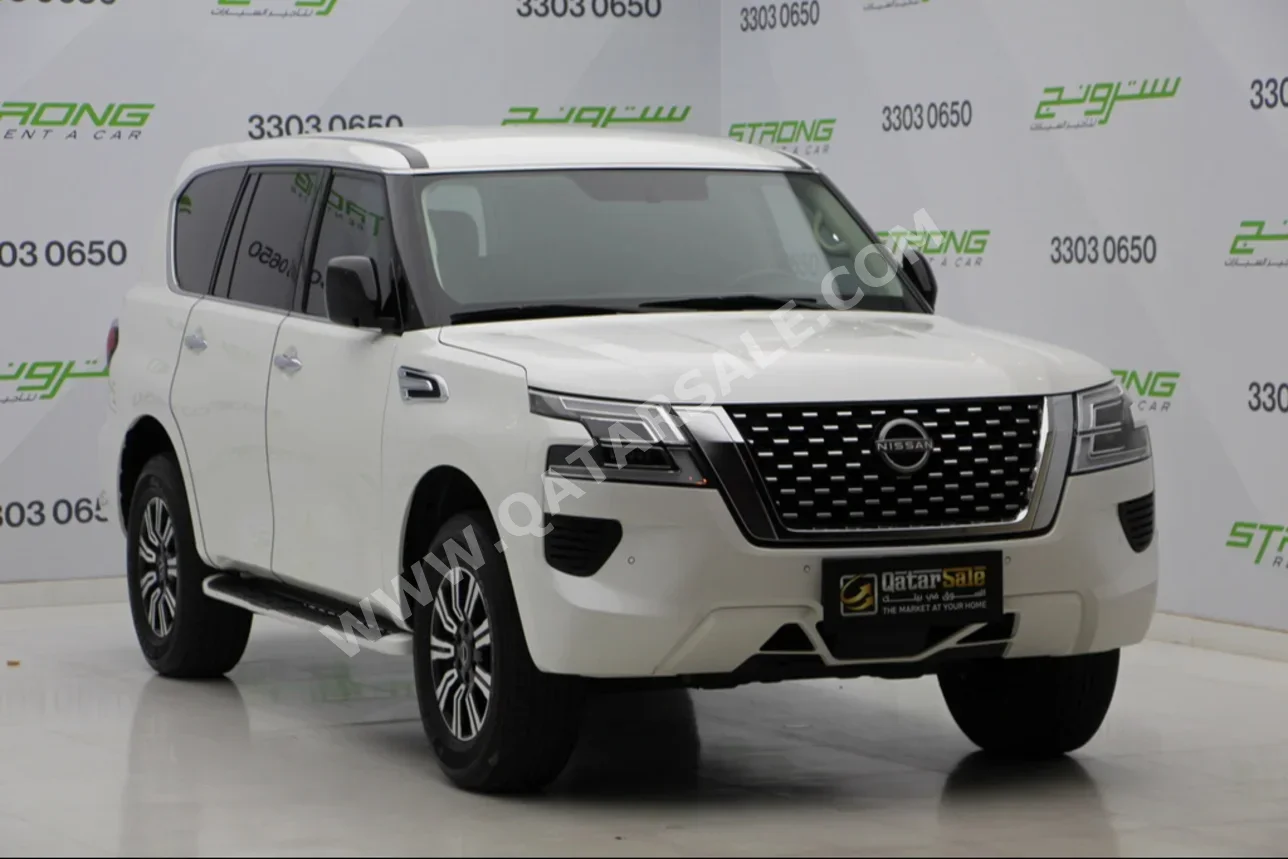 Nissan  Patrol  XE  2022  Automatic  34,000 Km  6 Cylinder  Four Wheel Drive (4WD)  SUV  White  With Warranty