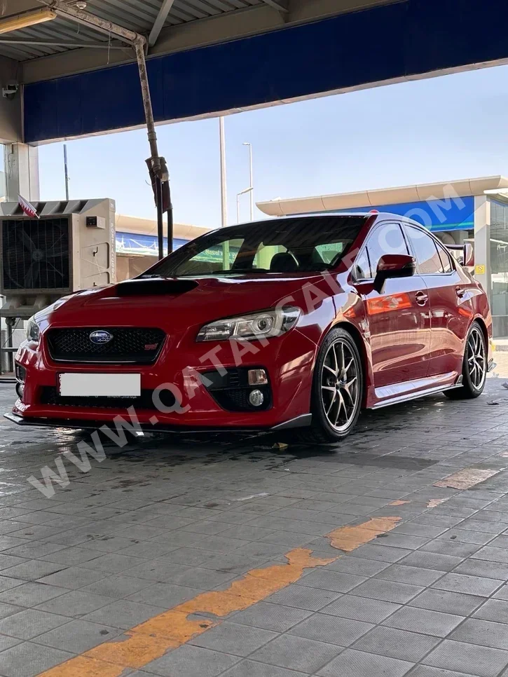 Subaru  STI  2015  Manual  39,144 Km  4 Cylinder  Four Wheel Drive (4WD)  Sedan  Red