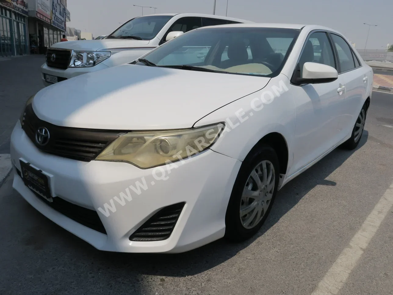 Toyota  Camry  GL  2014  Automatic  326,000 Km  4 Cylinder  Front Wheel Drive (FWD)  Sedan  White