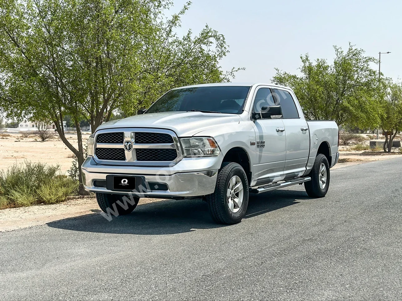 Dodge  Ram  SLT  2013  Automatic  249,000 Km  8 Cylinder  Four Wheel Drive (4WD)  Pick Up  Silver