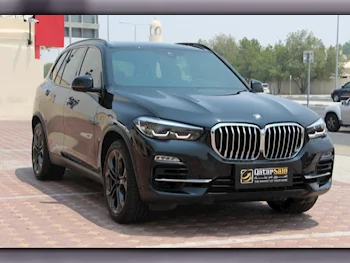 BMW  X-Series  X5 40i  2022  Automatic  30,000 Km  6 Cylinder  Four Wheel Drive (4WD)  SUV  Black  With Warranty