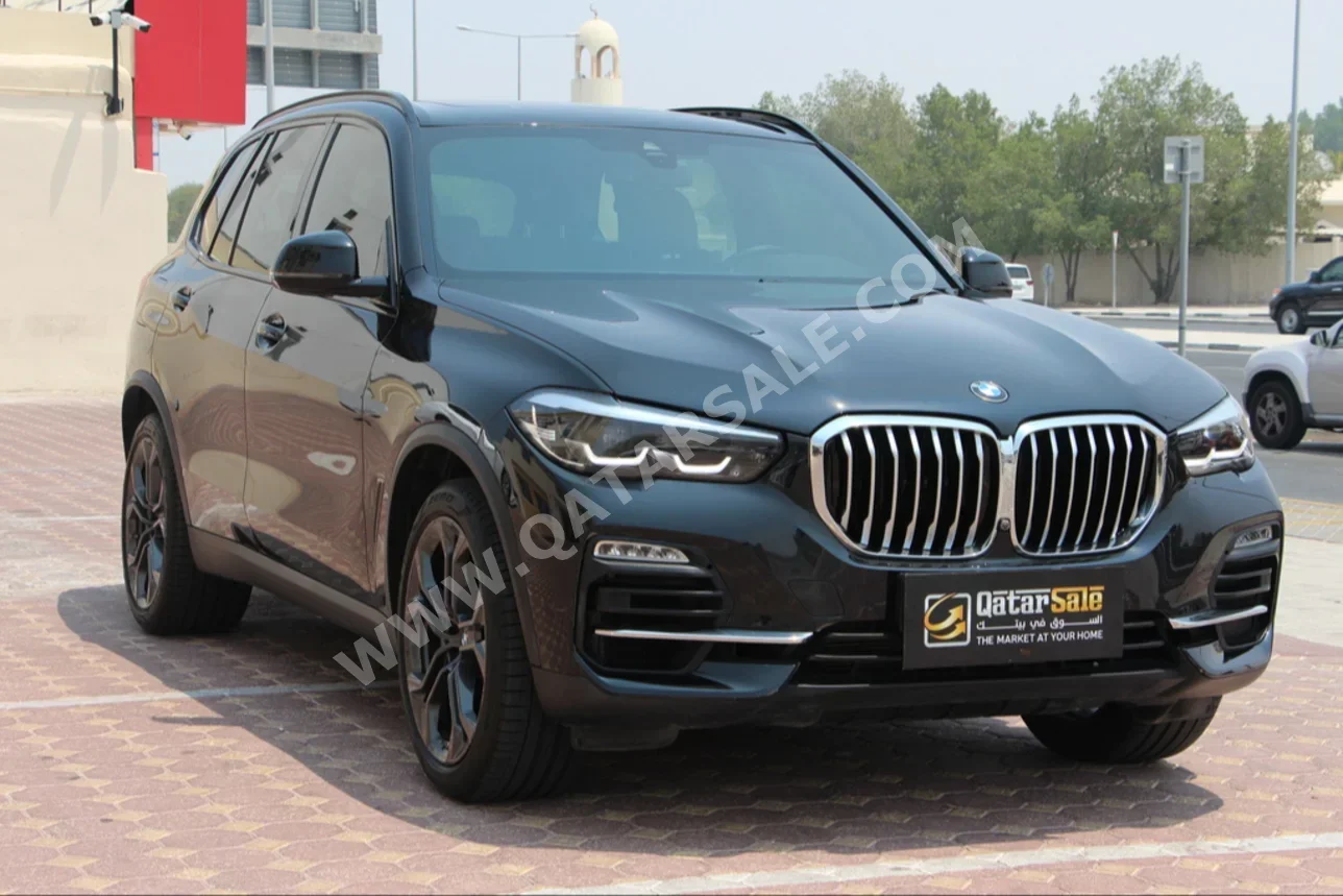 BMW  X-Series  X5 40i  2022  Automatic  30,000 Km  6 Cylinder  Four Wheel Drive (4WD)  SUV  Black  With Warranty