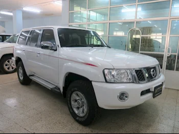 Nissan  Patrol  Safari  2023  Manual  12,000 Km  6 Cylinder  Four Wheel Drive (4WD)  SUV  White  With Warranty