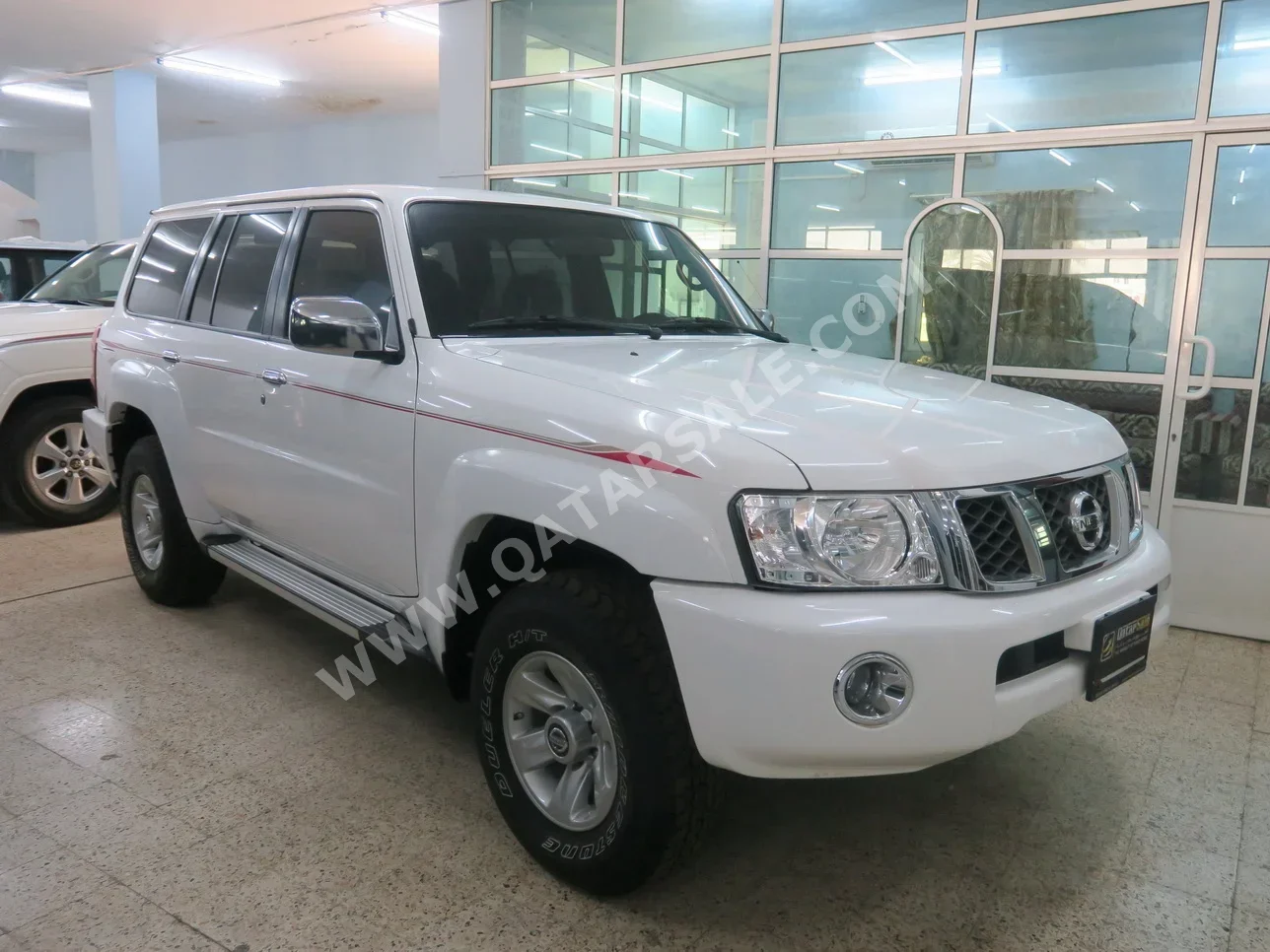 Nissan  Patrol  Safari  2023  Manual  12,000 Km  6 Cylinder  Four Wheel Drive (4WD)  SUV  White  With Warranty