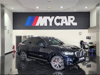 BMW  X-Series  X4  2022  Automatic  50,000 Km  4 Cylinder  Four Wheel Drive (4WD)  SUV  Dark Blue  With Warranty