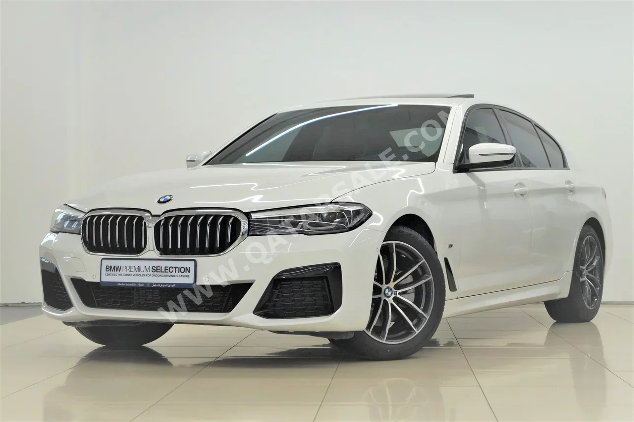 BMW  5-Series  520i  2021  Automatic  34,300 Km  4 Cylinder  Rear Wheel Drive (RWD)  Sedan  White  With Warranty