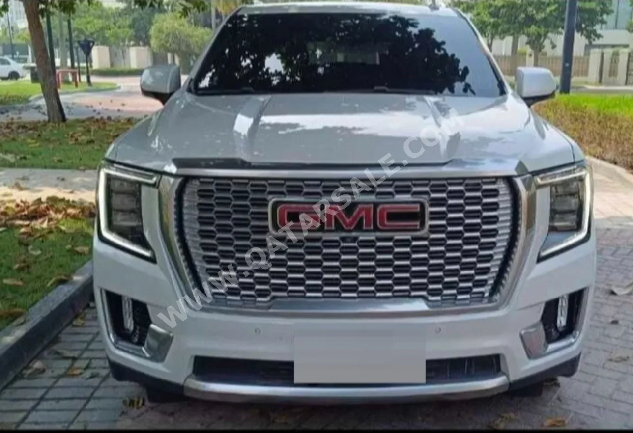 GMC  Yukon  Denali  2021  Automatic  121,000 Km  8 Cylinder  Four Wheel Drive (4WD)  SUV  White