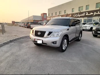 Nissan  Patrol  SE  2015  Automatic  126,000 Km  8 Cylinder  Four Wheel Drive (4WD)  SUV  Silver