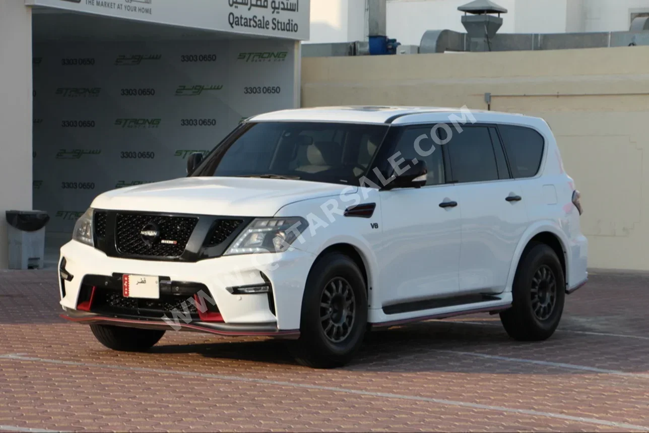 Nissan  Patrol  SE  2010  Automatic  300,000 Km  8 Cylinder  Four Wheel Drive (4WD)  SUV  White