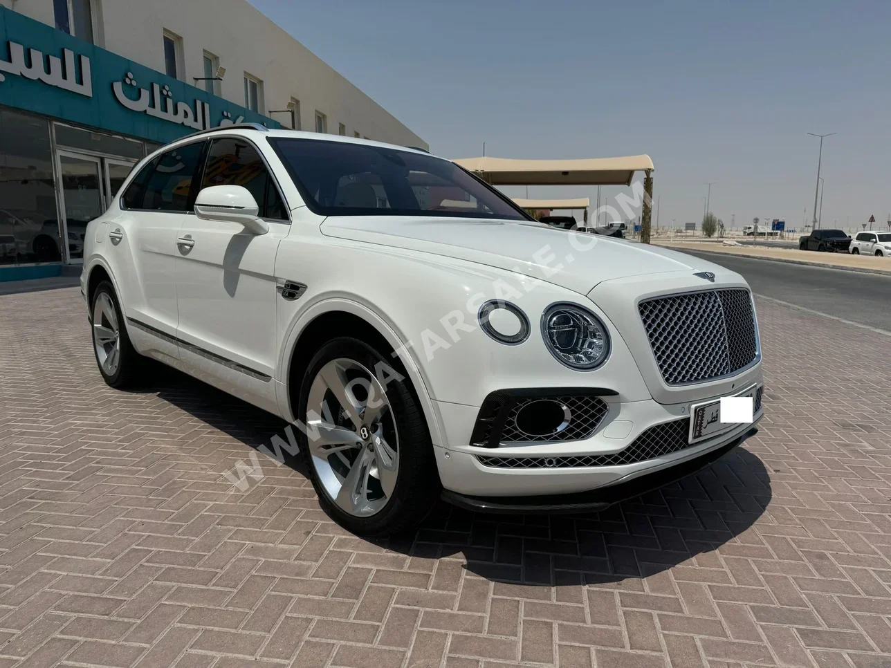 Bentley  Bentayga  2019  Automatic  26,000 Km  12 Cylinder  Four Wheel Drive (4WD)  SUV  White  With Warranty