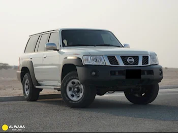 Nissan  Patrol  GL  2023  Automatic  10,000 Km  6 Cylinder  Four Wheel Drive (4WD)  SUV  White  With Warranty