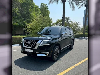 Nissan  Patrol  Platinum  2022  Automatic  26,552 Km  6 Cylinder  Four Wheel Drive (4WD)  SUV  Black  With Warranty