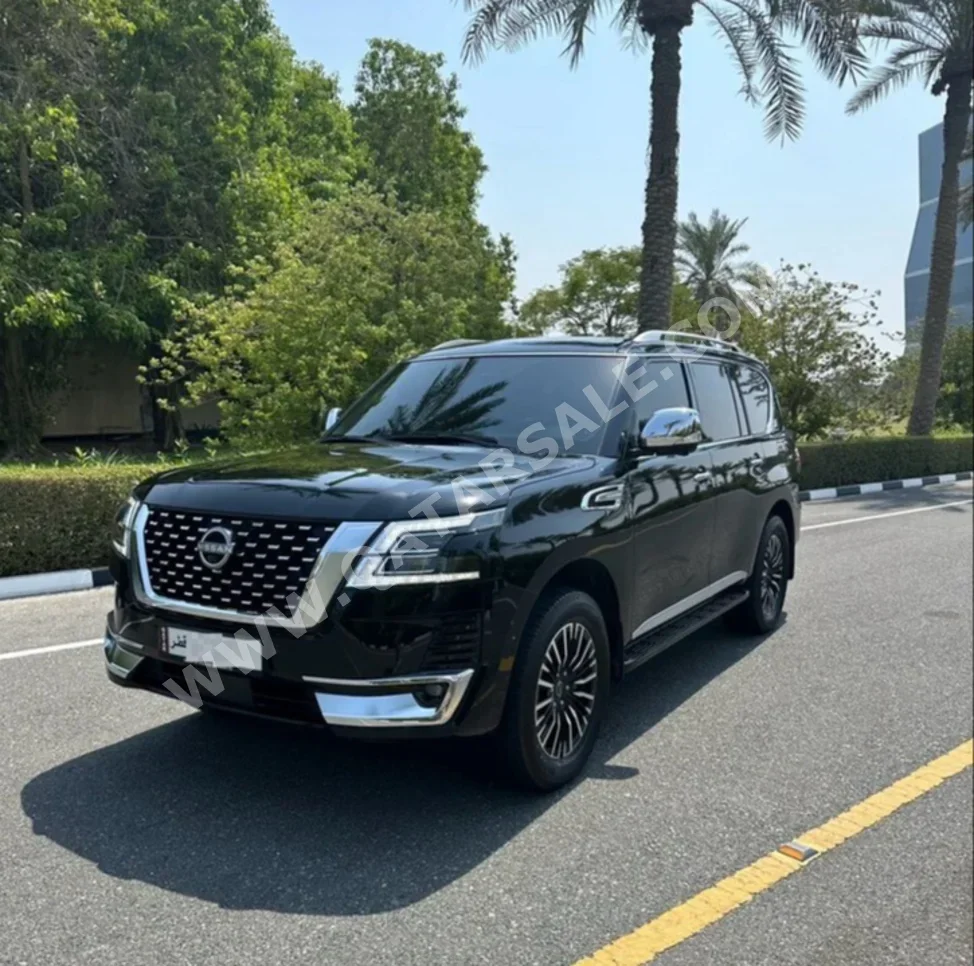 Nissan  Patrol  Platinum  2022  Automatic  26,552 Km  6 Cylinder  Four Wheel Drive (4WD)  SUV  Black  With Warranty