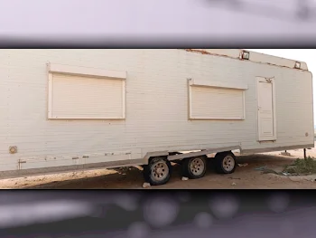 Caravan - 2013  - White  -Made in Qatar