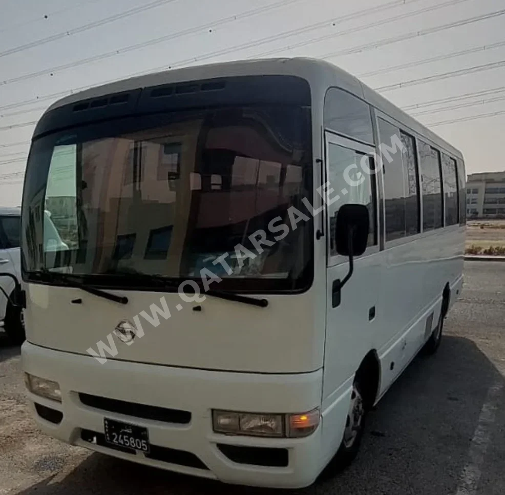 Nissan  Civilian  2013  Manual  134,000 Km  6 Cylinder  Front Wheel Drive (FWD)  Van / Bus  White