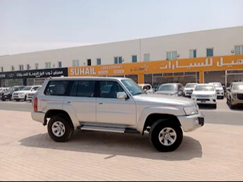 Nissan  Patrol  Safari  2022  Manual  62,000 Km  6 Cylinder  Four Wheel Drive (4WD)  SUV  Silver  With Warranty