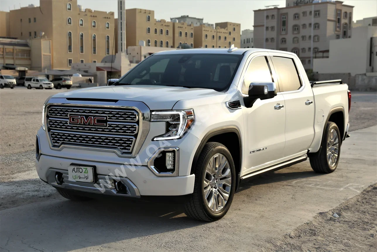 GMC  Sierra  Denali  2021  Automatic  42,600 Km  8 Cylinder  Four Wheel Drive (4WD)  Pick Up  White