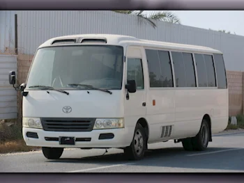 Toyota  Coaster  2014  Manual  180,000 Km  4 Cylinder  Rear Wheel Drive (RWD)  Van / Bus  White