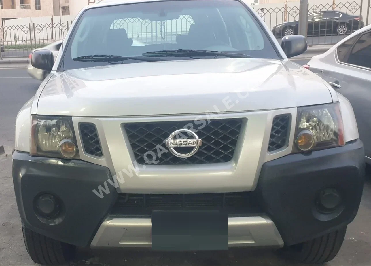 Nissan  Xterra  2010  Automatic  230,000 Km  6 Cylinder  Four Wheel Drive (4WD)  SUV  Silver