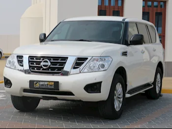 Nissan  Patrol  XE  2018  Automatic  105,630 Km  6 Cylinder  Four Wheel Drive (4WD)  SUV  White