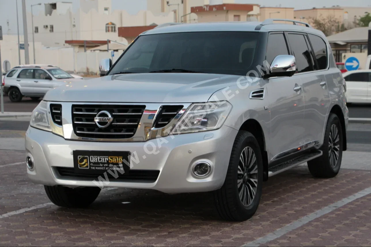 Nissan  Patrol  Platinum  2015  Automatic  240,000 Km  8 Cylinder  Four Wheel Drive (4WD)  SUV  Silver